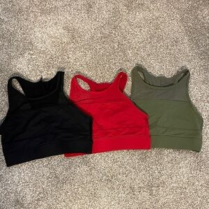 Stylish Sports Bra Trio in Black, Red, and Green